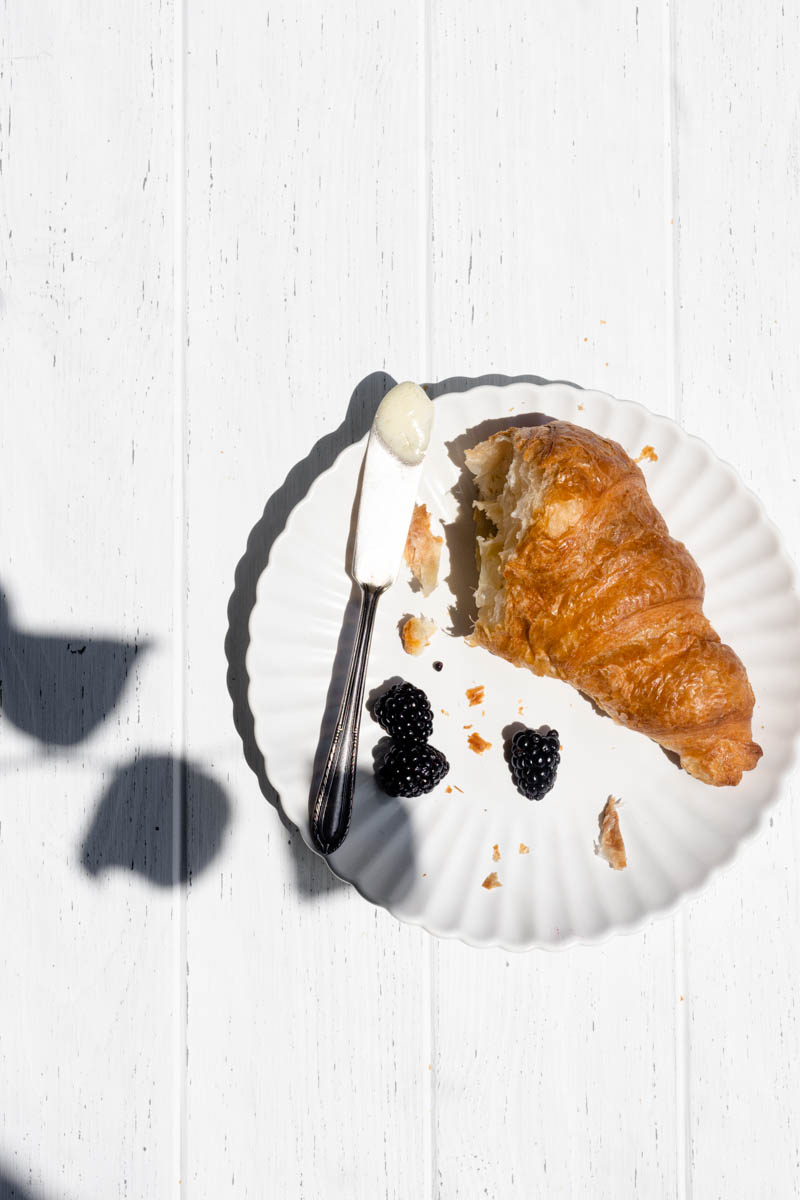 Minimalist food photography techniques were used to style this Croissant shot.